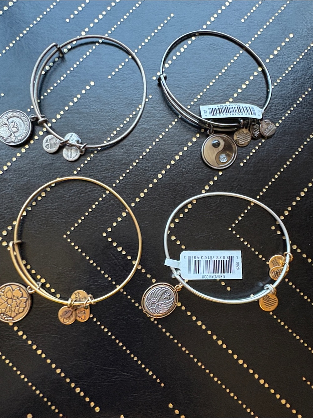 Alex and Ani set of 4 bracelets.